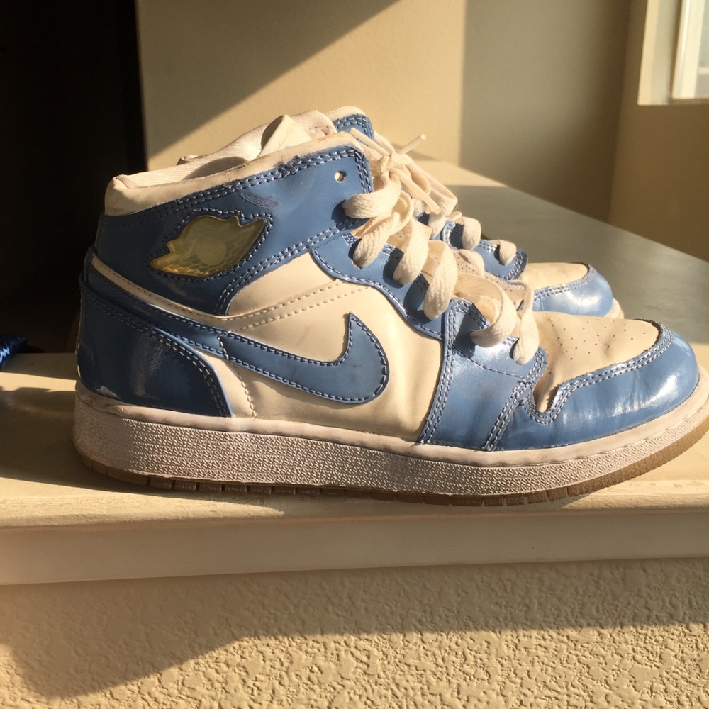 Glossy baby blue and white Jordan 1s